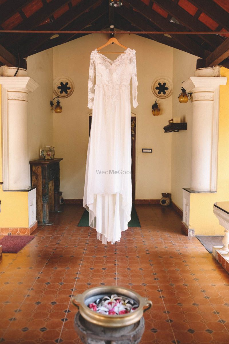 Photo of Wedding Gown on a Hanger Shot