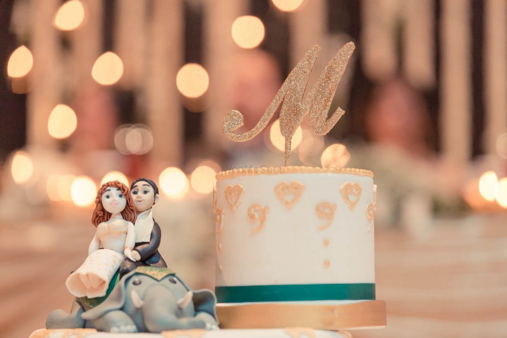 Photo of White and Gold Wedding Cake