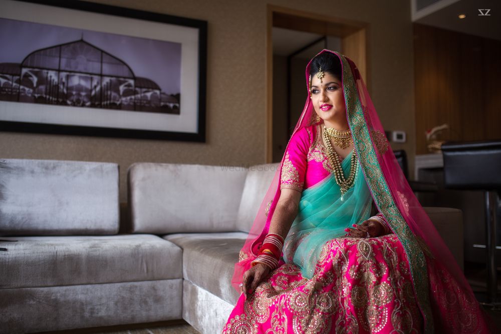 Photo of Fuchsia Pink and Mint Bride Candid Portrait