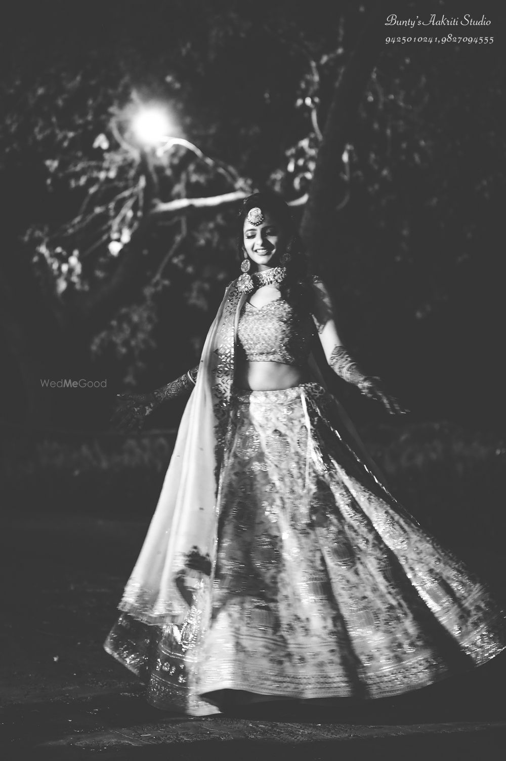 Photo of Black and white mehendi bridal portrait