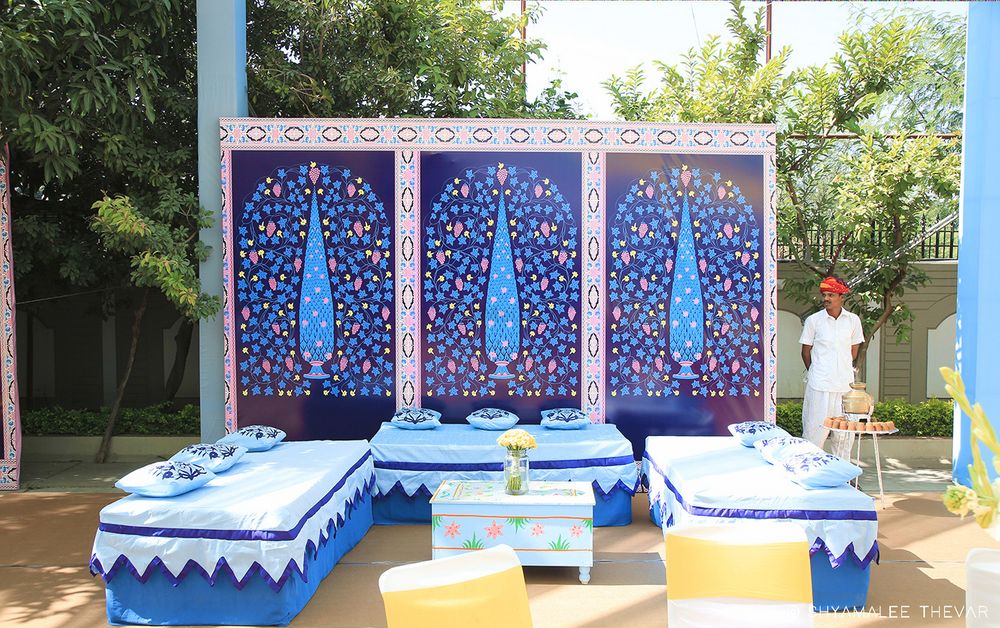 Photo of Mehendi printed backdrop idea in shades of blue