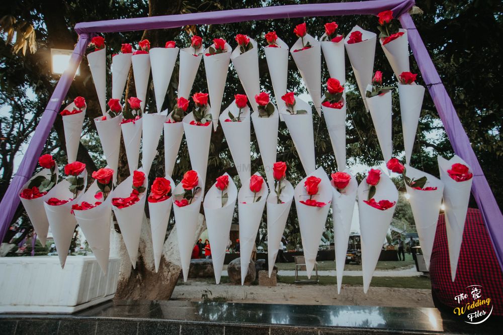 Photo of Petals and roses in cones for guests to throw on couple