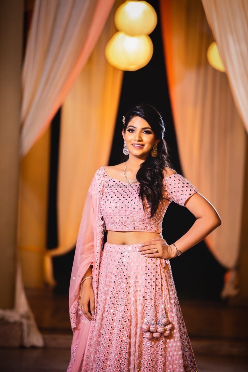 Photo of Bride in light pink sequin lehenga for engagement