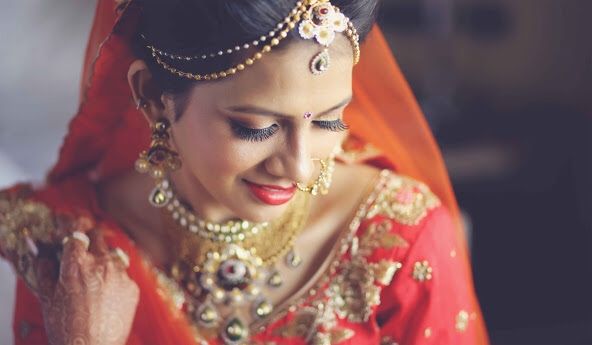 Photo of Gold Mathapatti and Gold Earrings