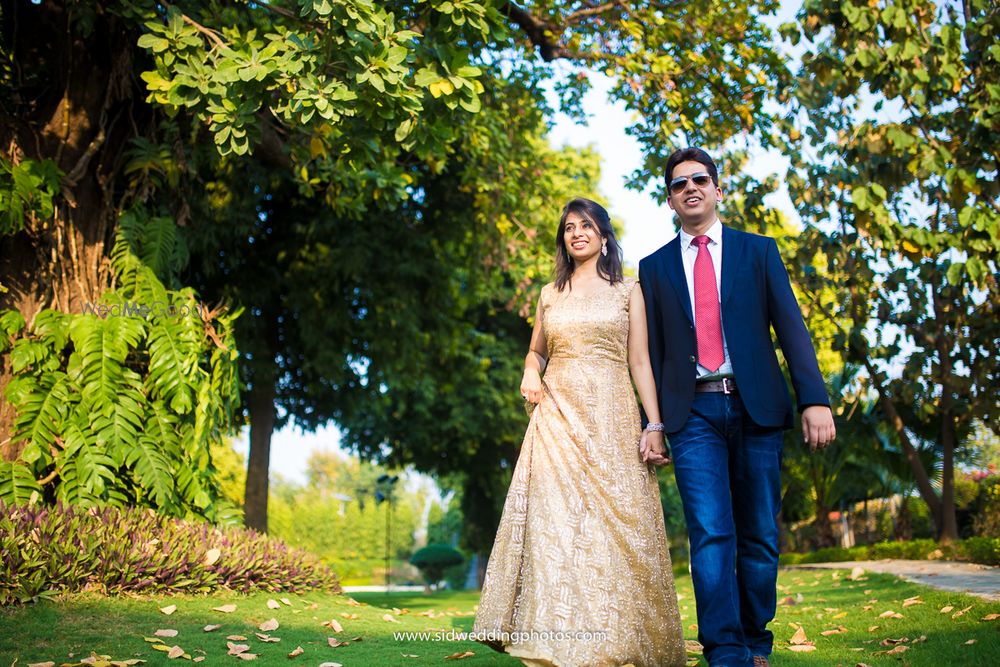 Photo of Couple Walking Candid Pre-Wedding Shoot