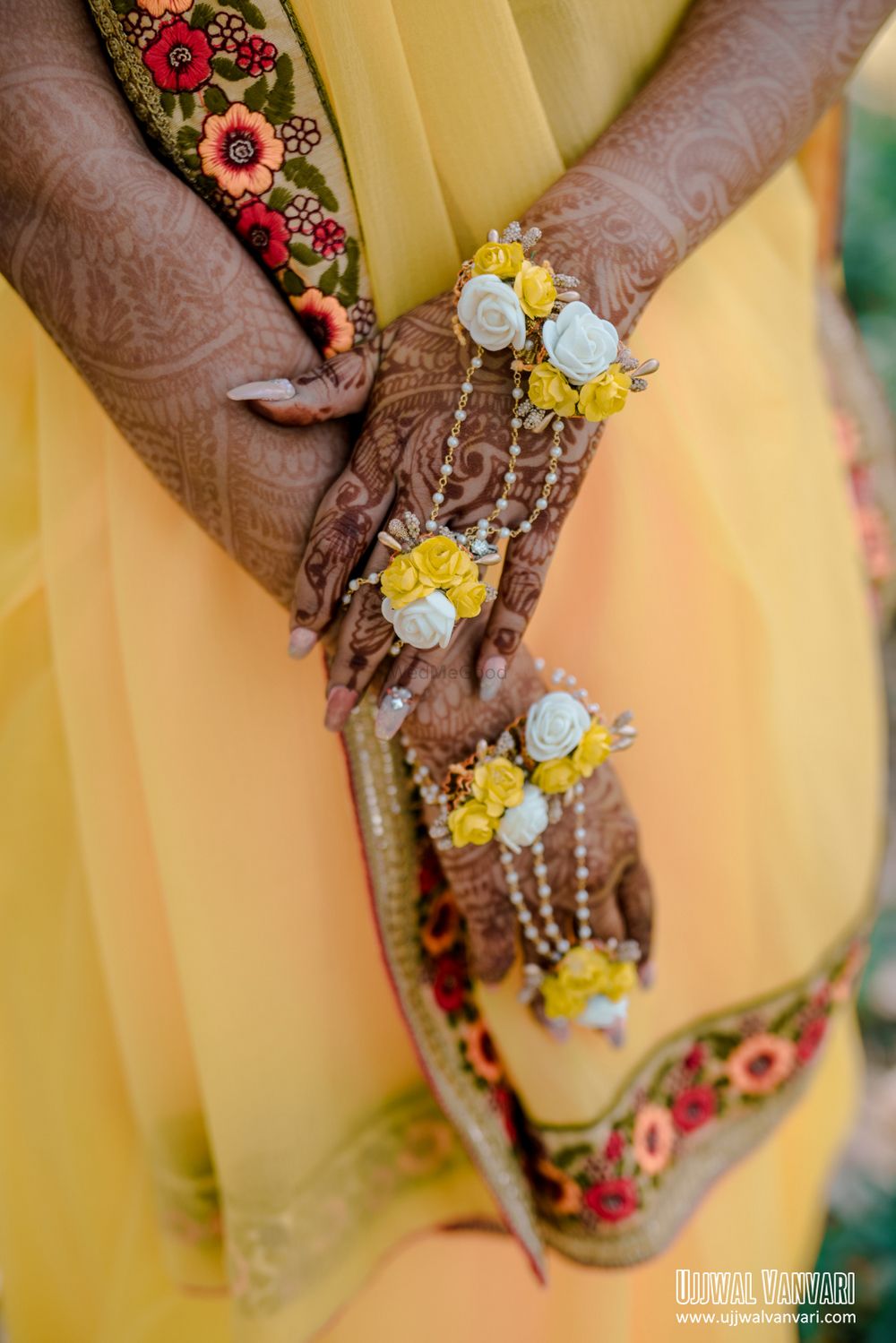 Photo of Floral jewellery with white and yellow haathphool with pearls