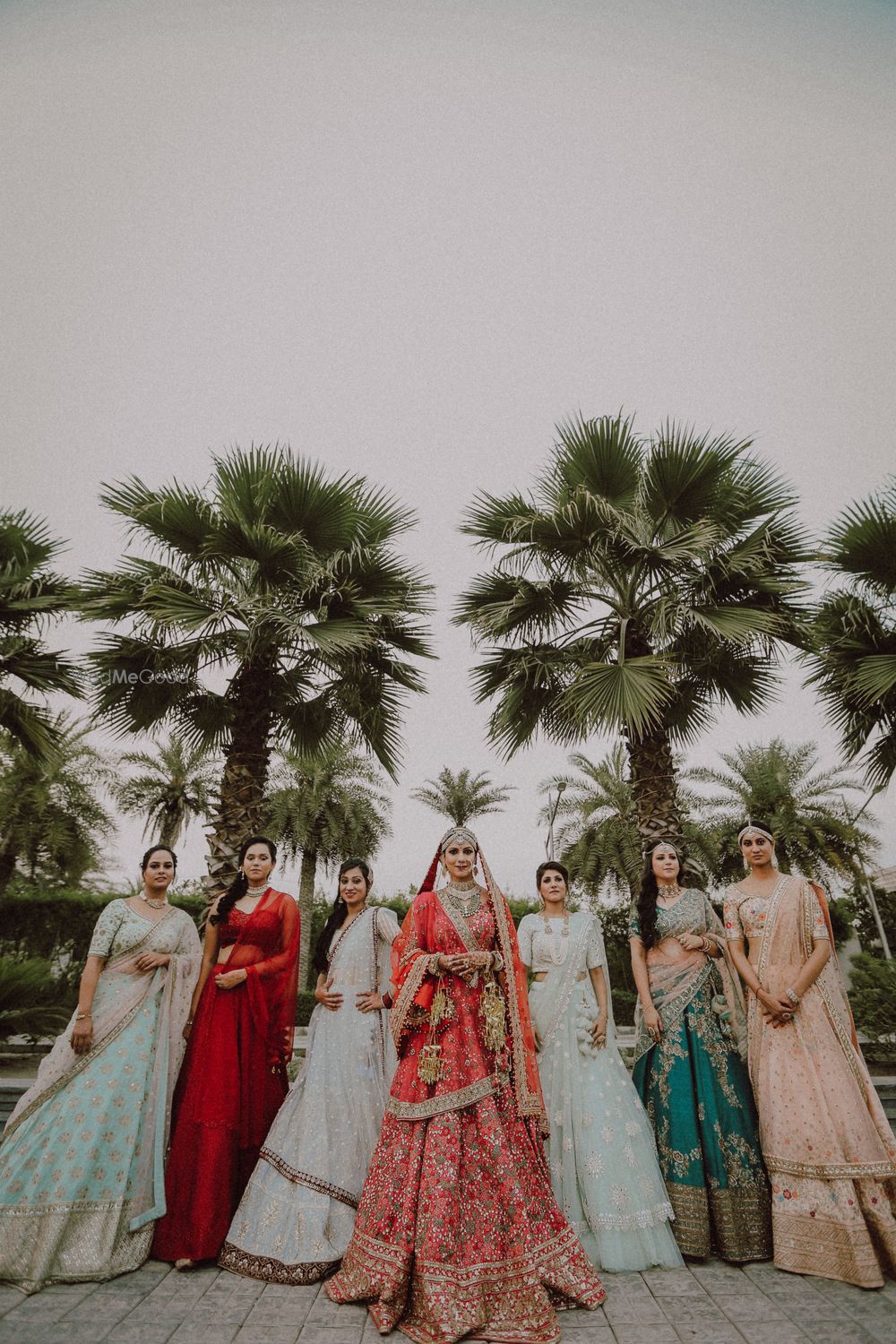 Photo of bride and bridesmaids shot