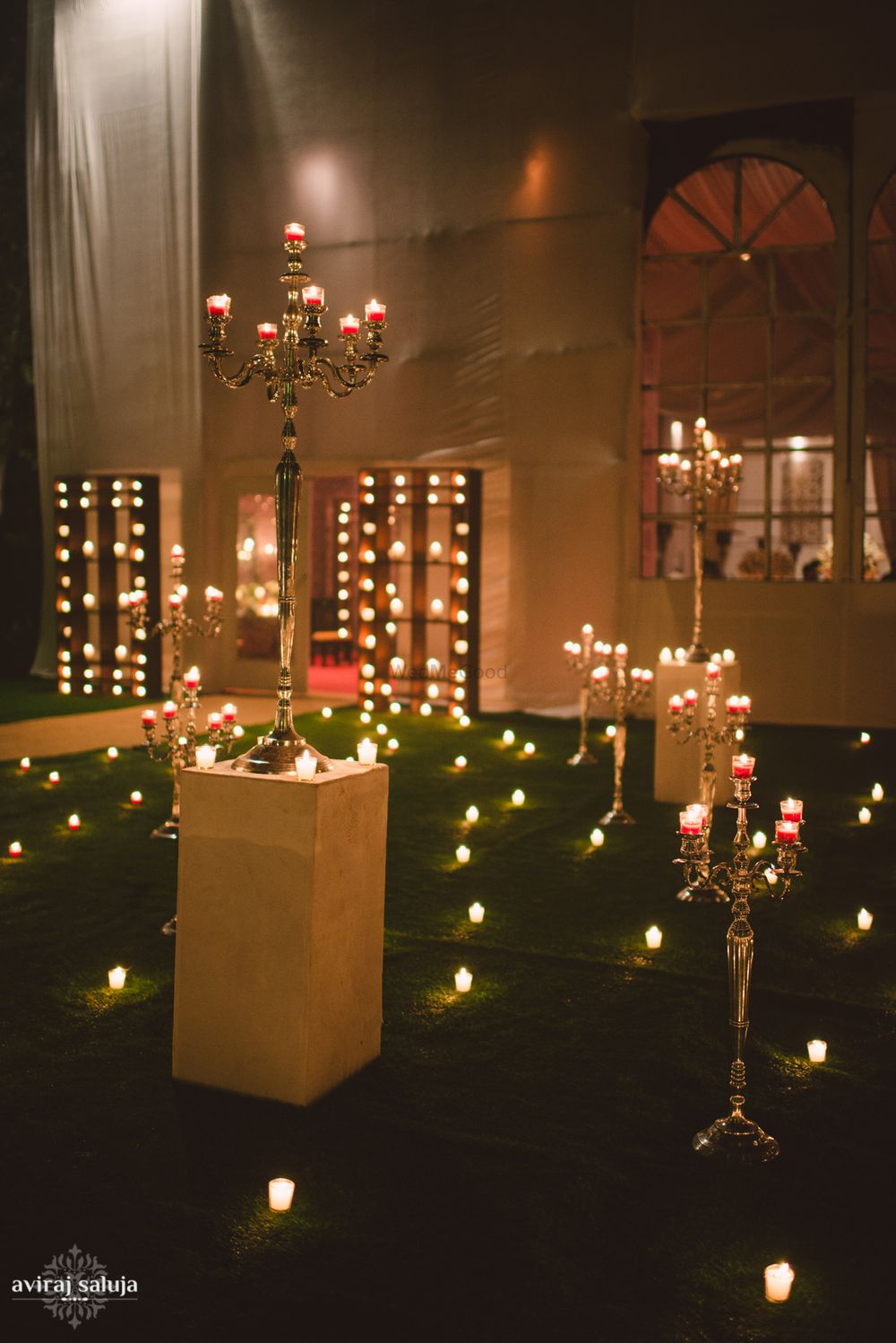 Photo of Dim Light Outdoor Decor with Candelabras and Candles