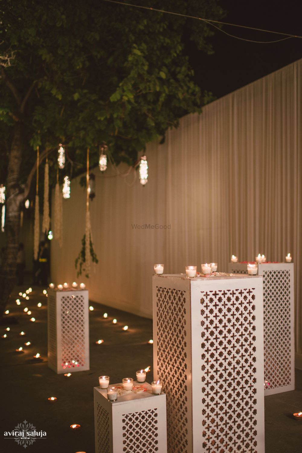 Photo of Night Outdoor Decor with Candles and Fairy Lights