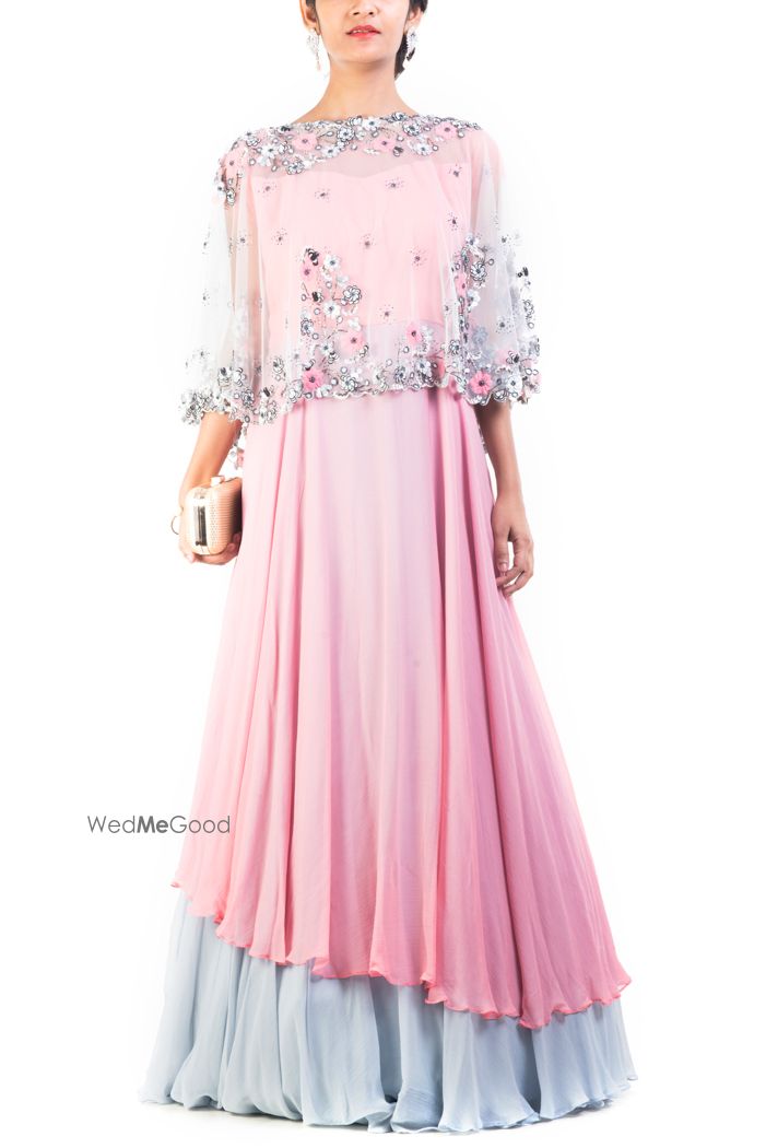 Photo of Pastel Pink and Pastel Blue Gown with Transparent Cape