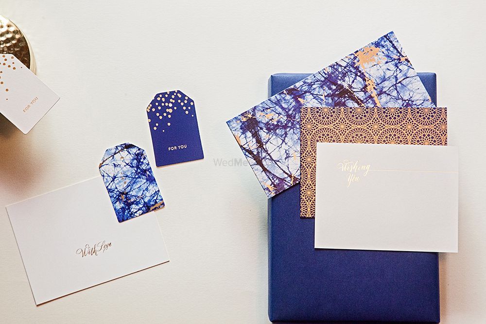 Photo of Indigo Blue and Gold Tie-Dye Wedding Cards