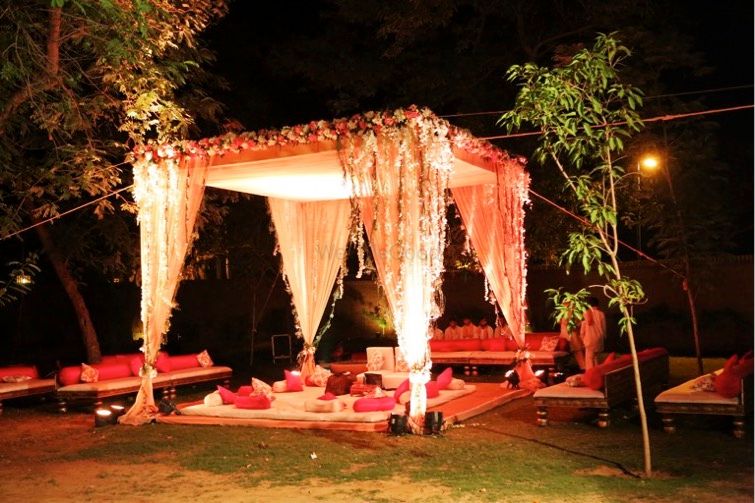 Photo of Curtain Drape Shacks with Fairy Lighting and Low Seats