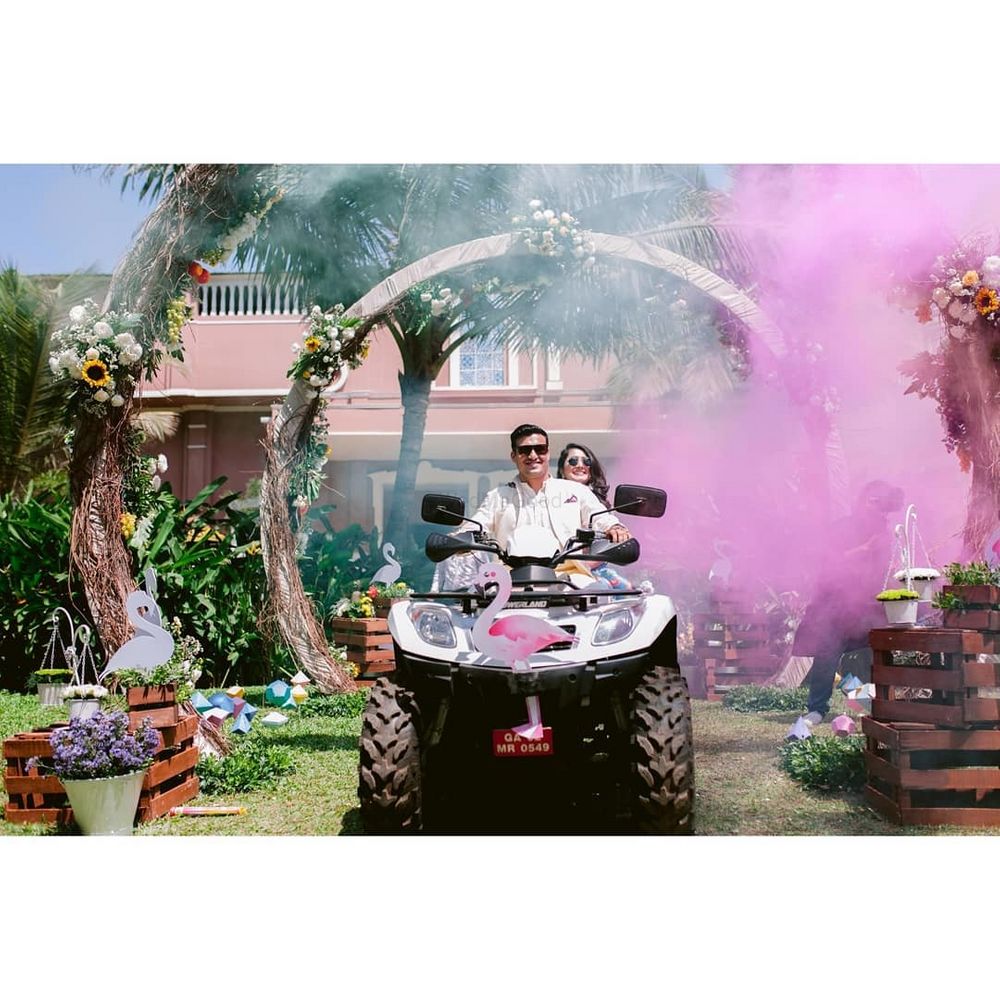 Photo of Couple entering on flamingo theme atv on mehendi