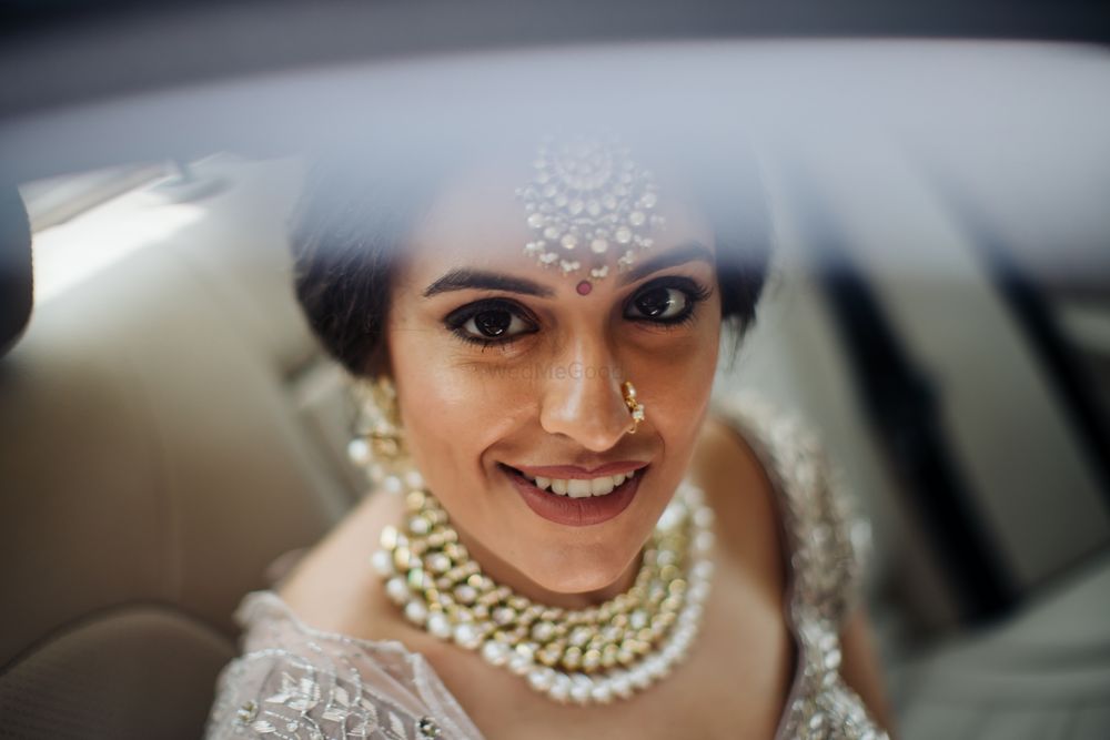 Photo of A bride getting ready on her wedding day