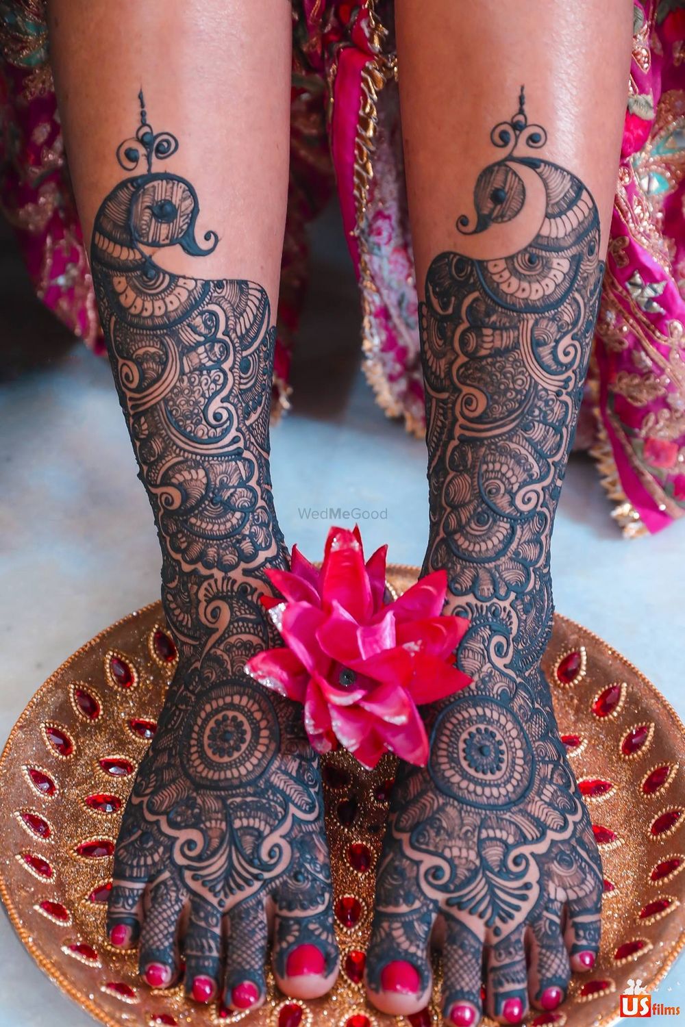 Photo of A shot of a bride's feet mehendi design