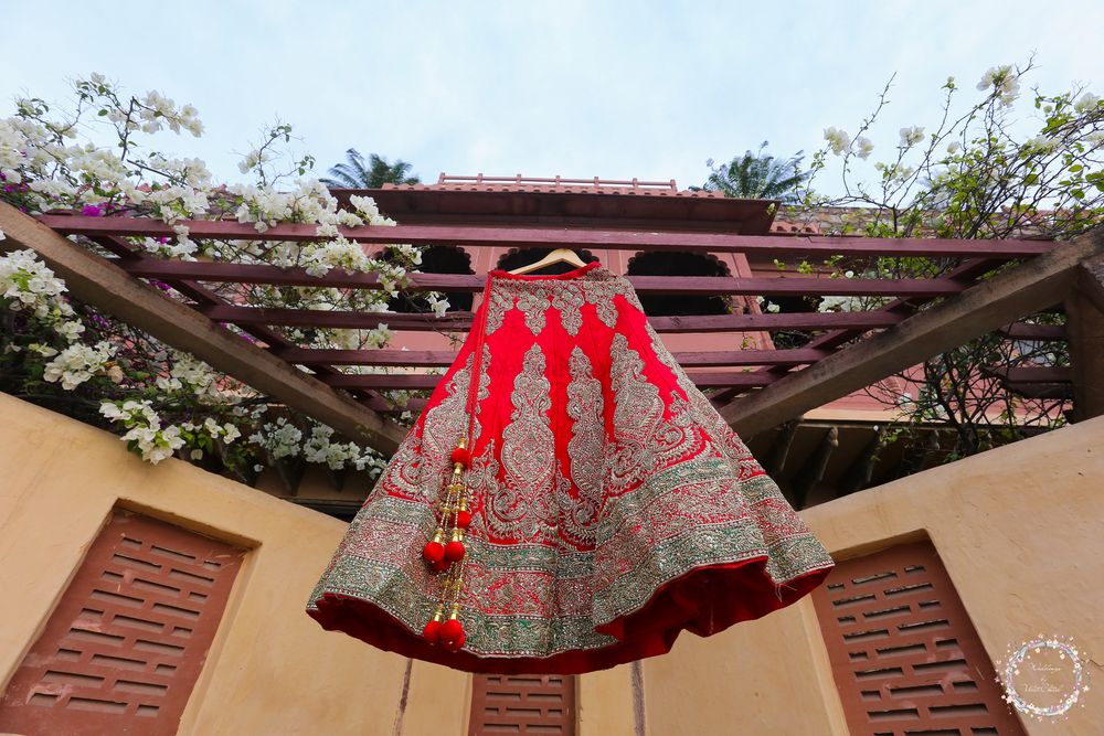 Photo of Red Bridal Lehenga on a Hanger