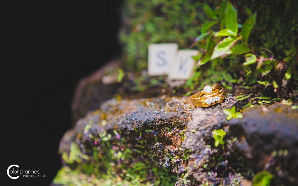 Photo of Engagement RIngs on Rocks with Monograms