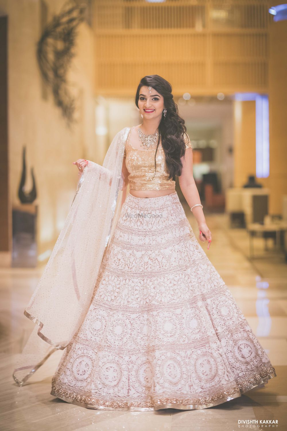 Photo of Off White Lehenga with Gold Blouse