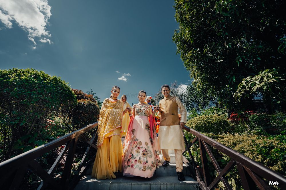 Photo of Mehendi bridal entry portrait with family