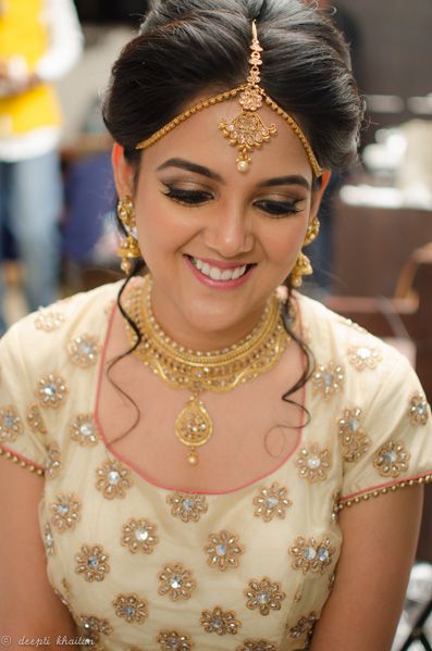 Photo of Gold Necklace and Earrings with Mathapatti