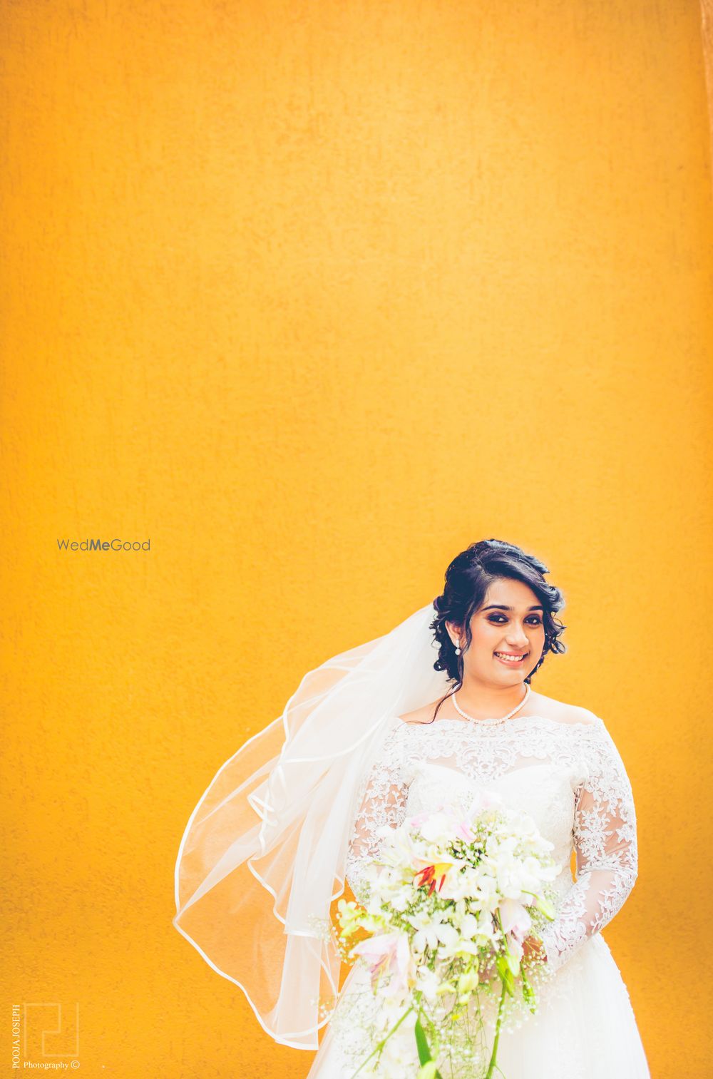 Photo of Christian Bride Shot with Floral Bouquet