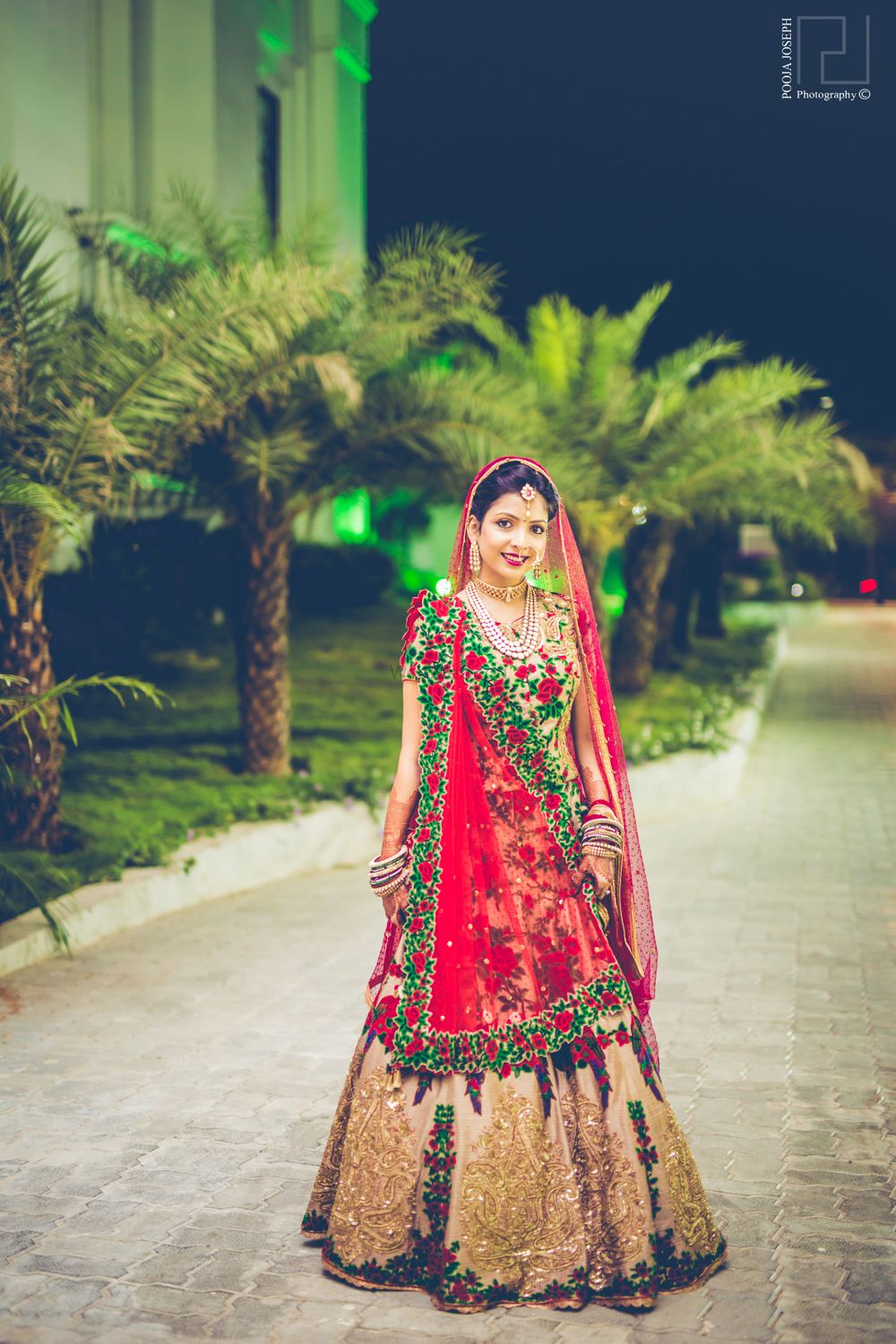 Photo of Red, Geen and Gold Bridal Lehenga