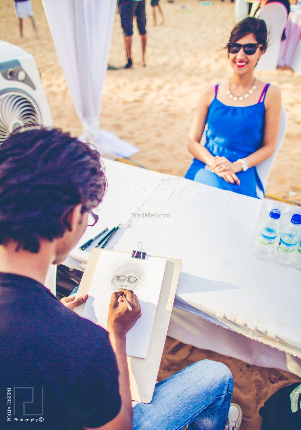 Photo of Live Sketching Booth at Beach Wedding