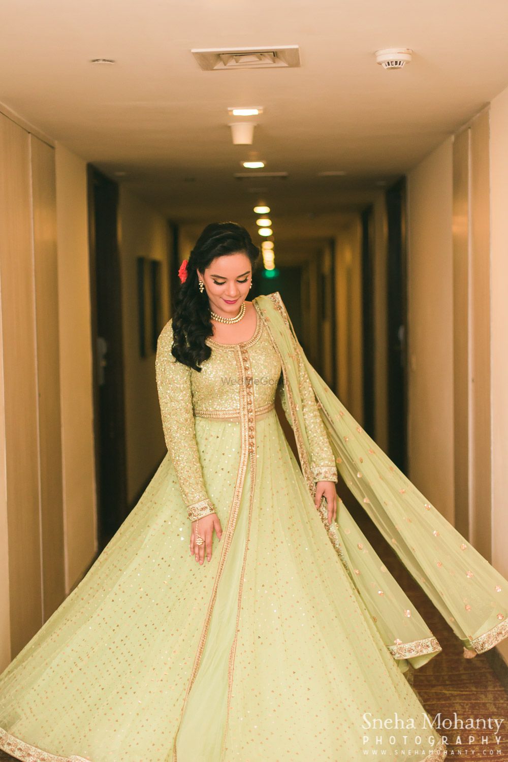 Photo of Twirling Mint Lehenga with Godl Sequins and Zarodis