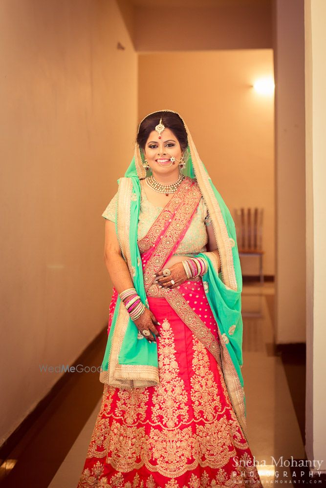 Photo of Bright Pink with Sea Green Lehenga