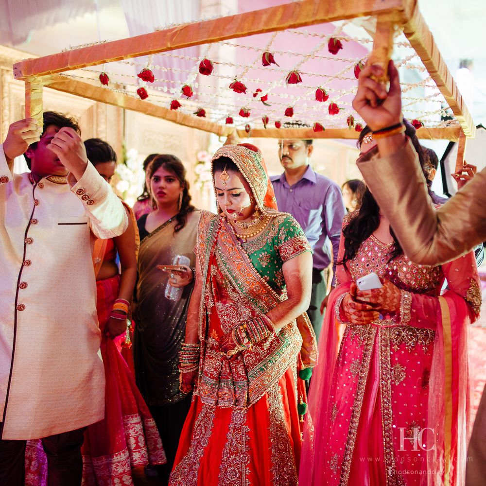 Photo of Bride Entrance under Floral Chaadar