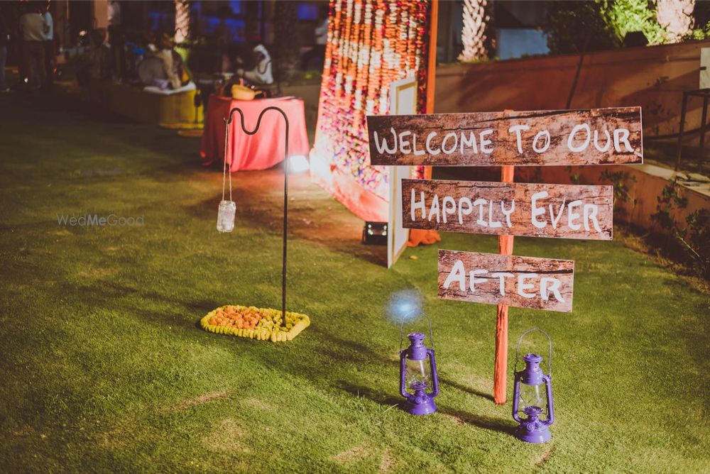 Photo of Wooden Quotes Entrance Decor with Lanterns