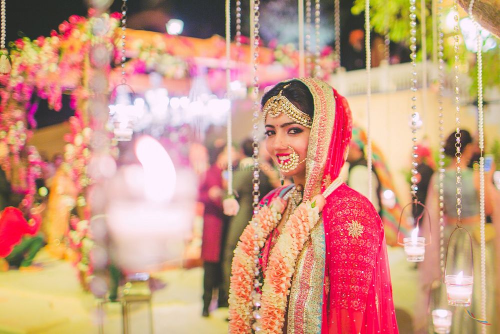 Photo of Pink Bride with Jai Mala and Mathapatti