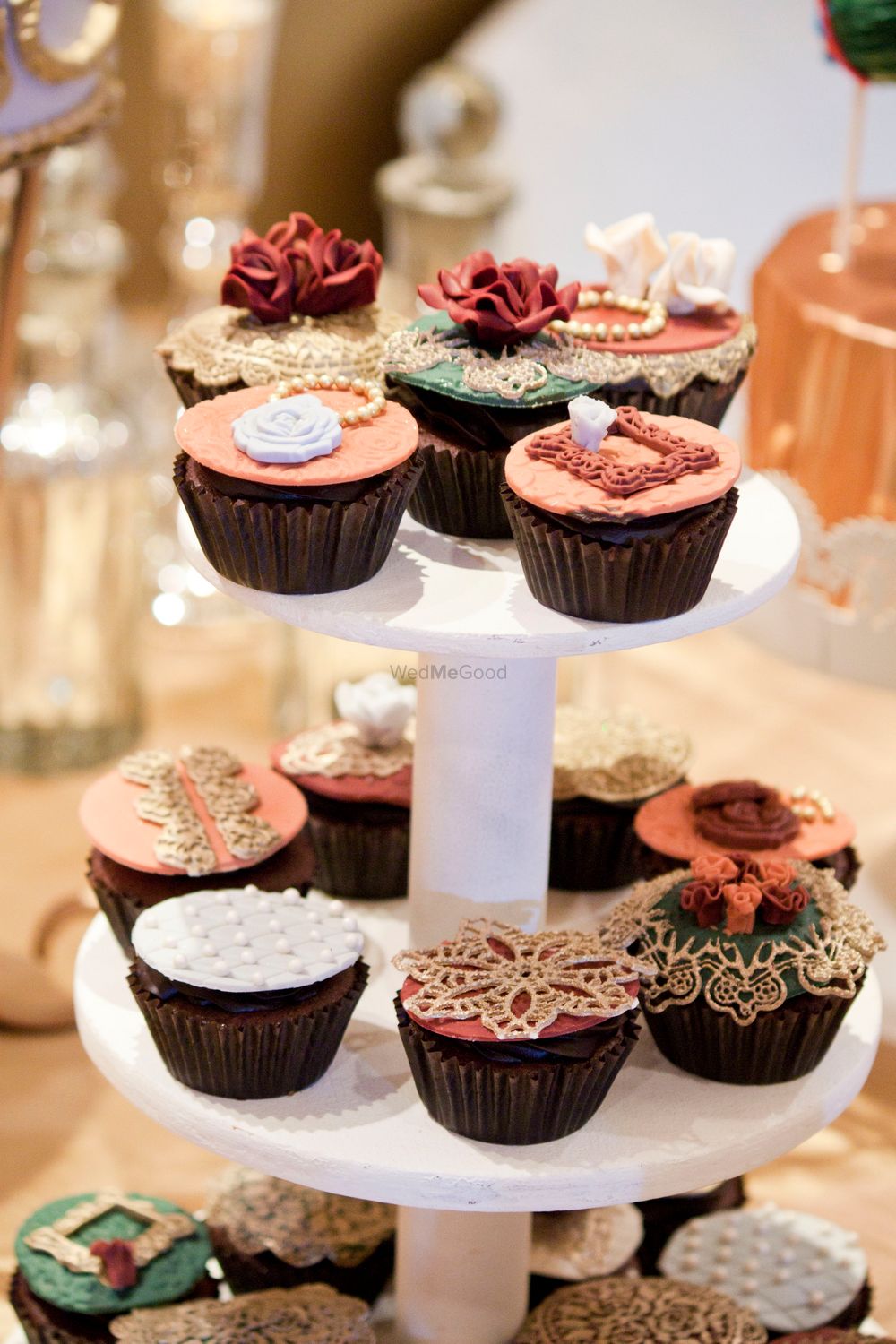 Photo of Chocolate Cupcakes with Pastel Wedding Decor