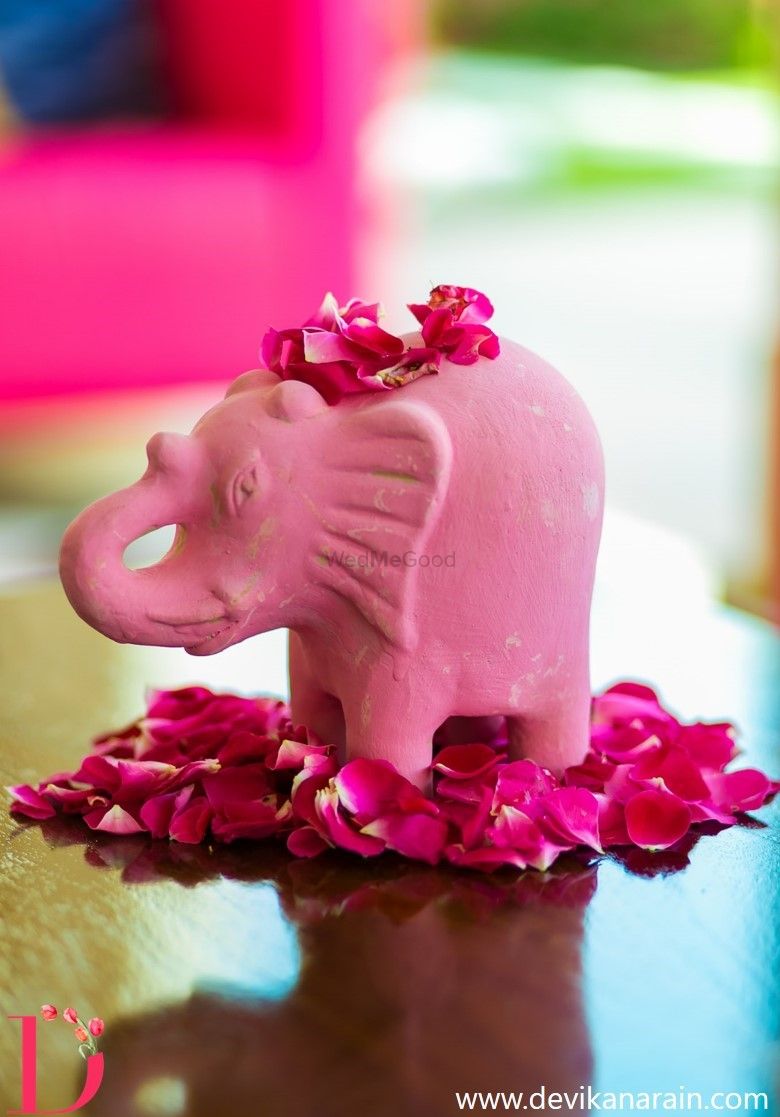 Photo of Light Pink Elephant with Rose Petals