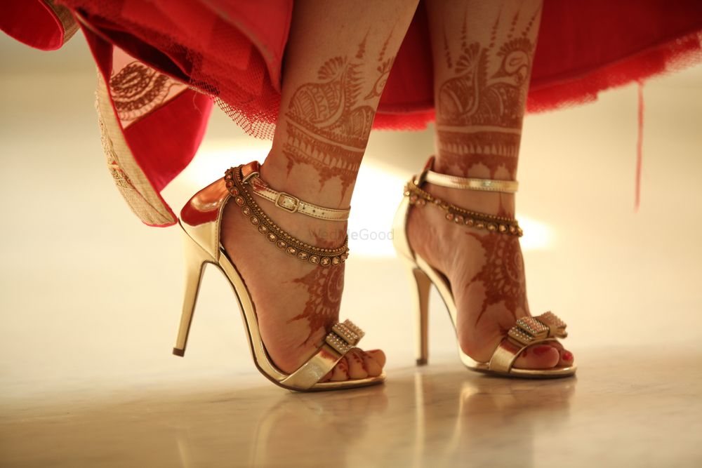 Photo of Gold Bridal Shoes with Anklets and Mehendi