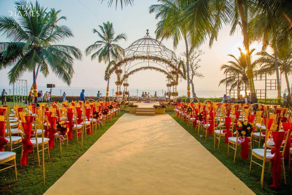 Photo of Mandap by the beach with chairs