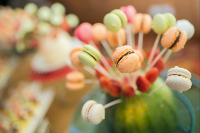 Photo of Mini Macaroons on a stick for a wedding