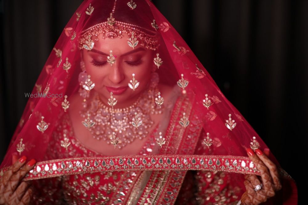 Photo of Red net dupatta as a veil.