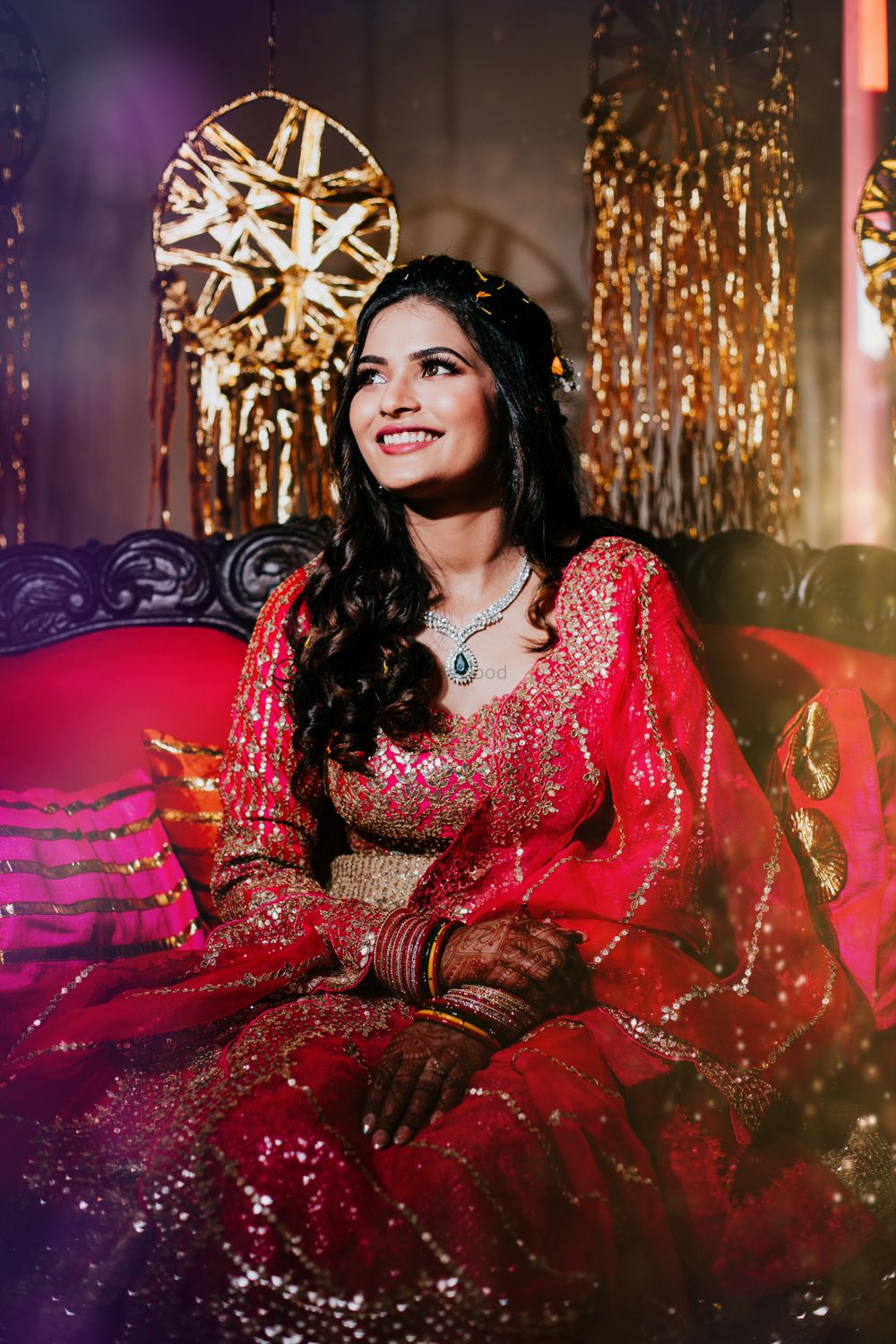 Photo of bridal portrait with long hair and red lehenga