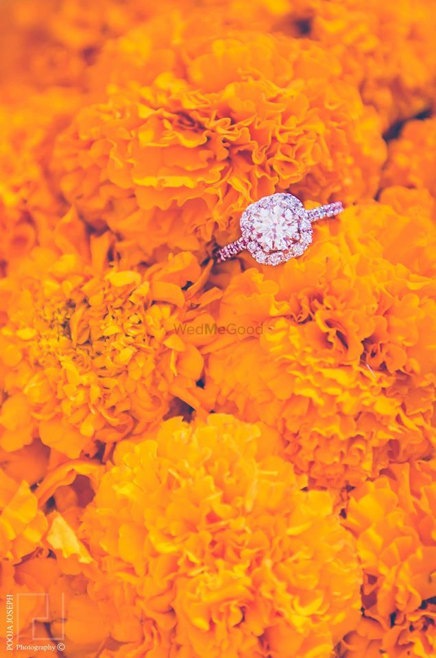 Photo of Diamond Solitaire Engagement Ring on Genda Phool Shot
