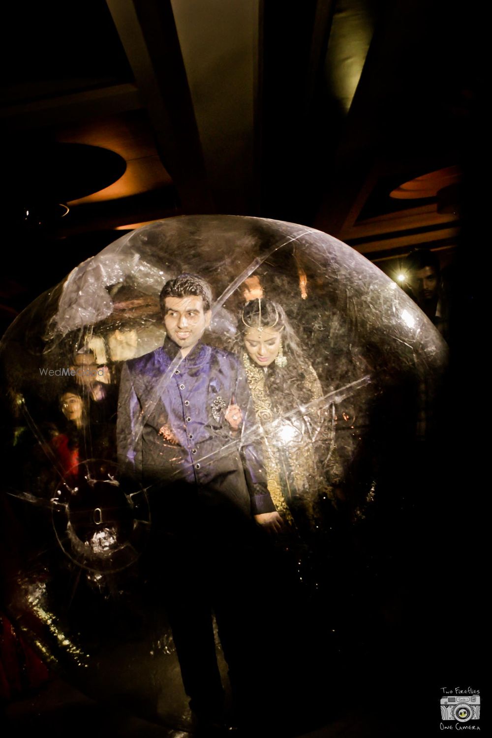 Photo of Bride and groom entry in a zorbing ball