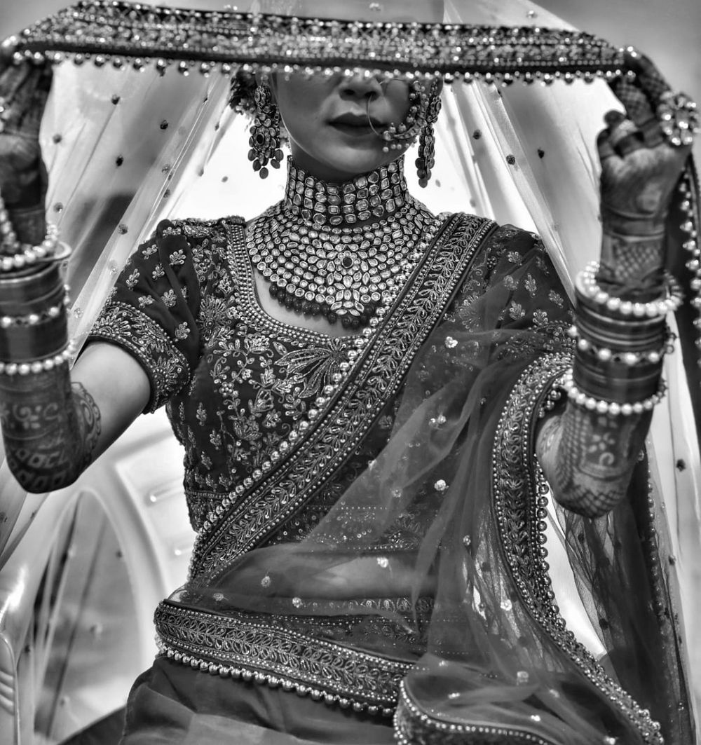 Photo of A bridal shot with jewellery's unique detailing.