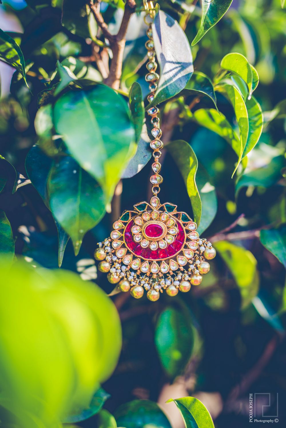 Photo of Gold Maangtikka with Ruby and Emerald Stones