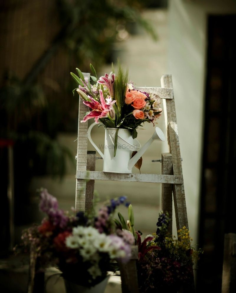 Photo of DIY Floral Arrangement in White Watering Can