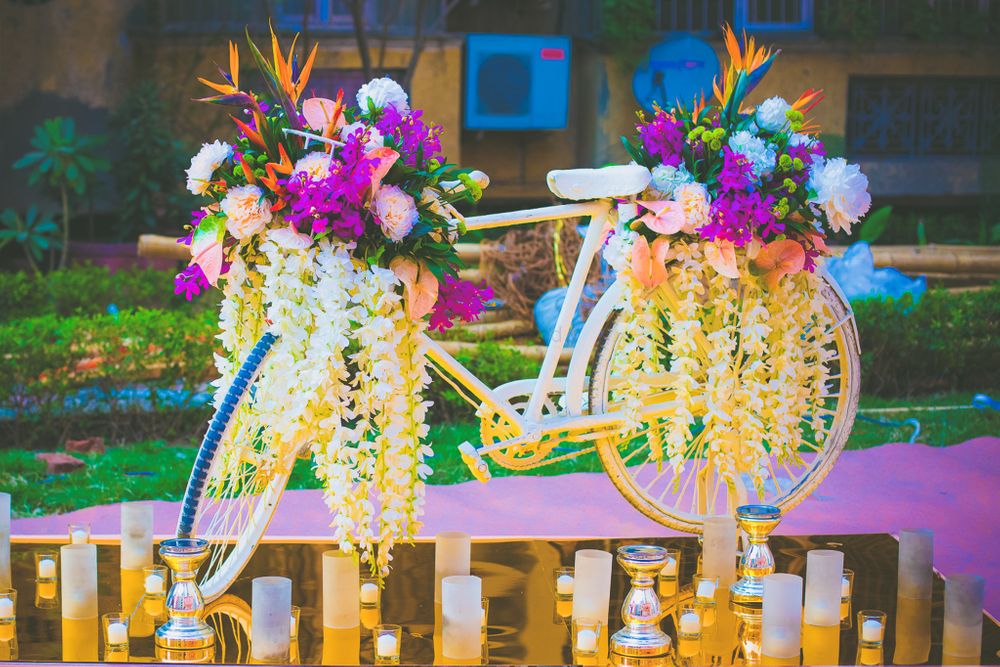 Photo of Gold Bicycle with Floral Decor