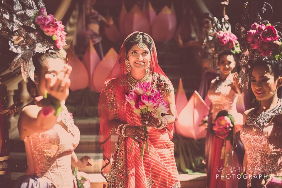 Photo of Pink Bride Entry with Floral Bouquet