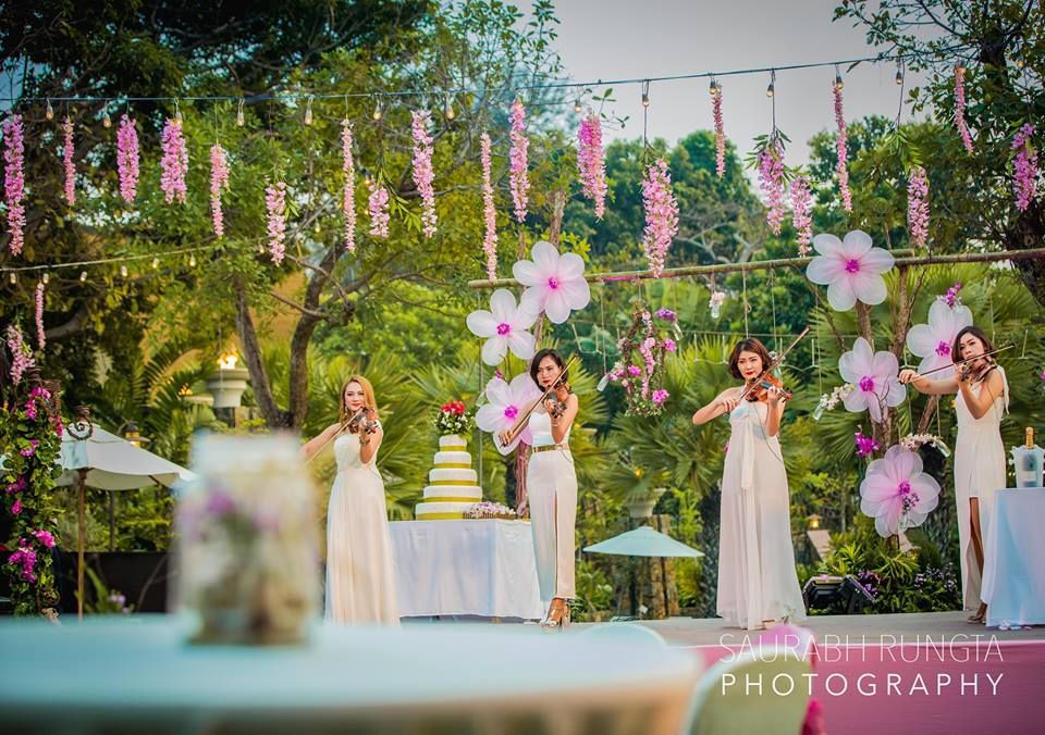 Photo of Purple and White Floral Day Themed Decor