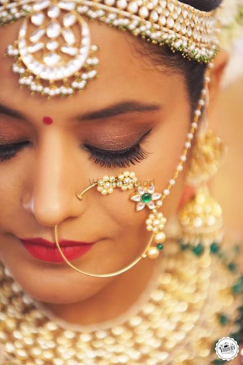 Photo of Round bridal Nath with embellishment