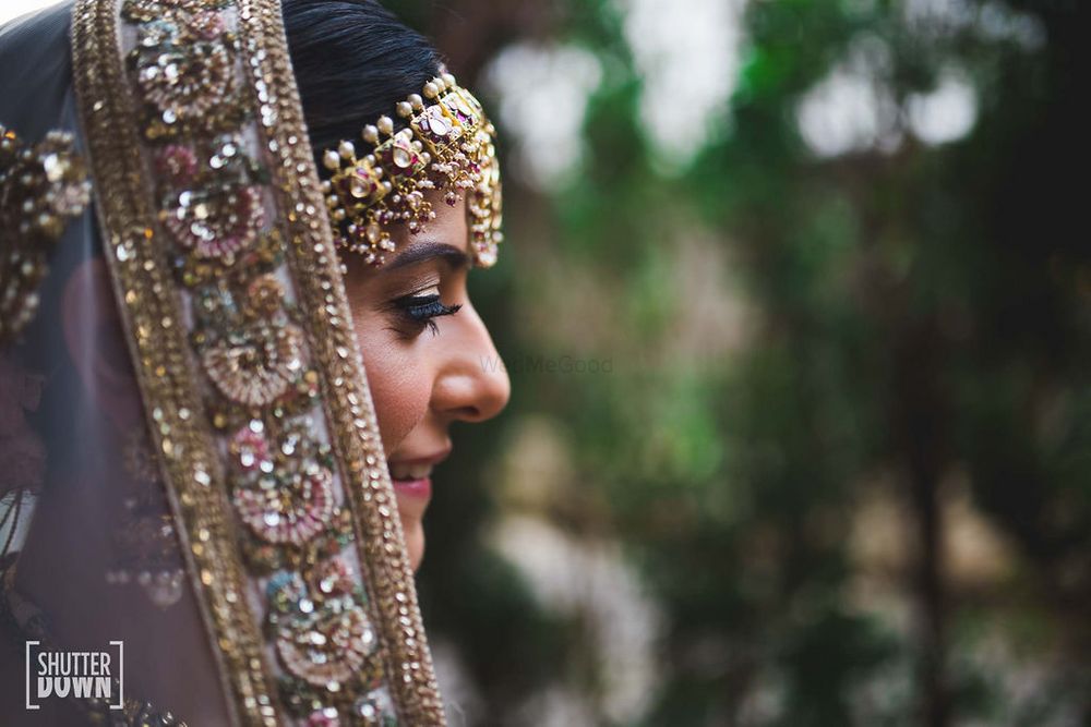 Photo of close up bridal shot with dupatta detailing