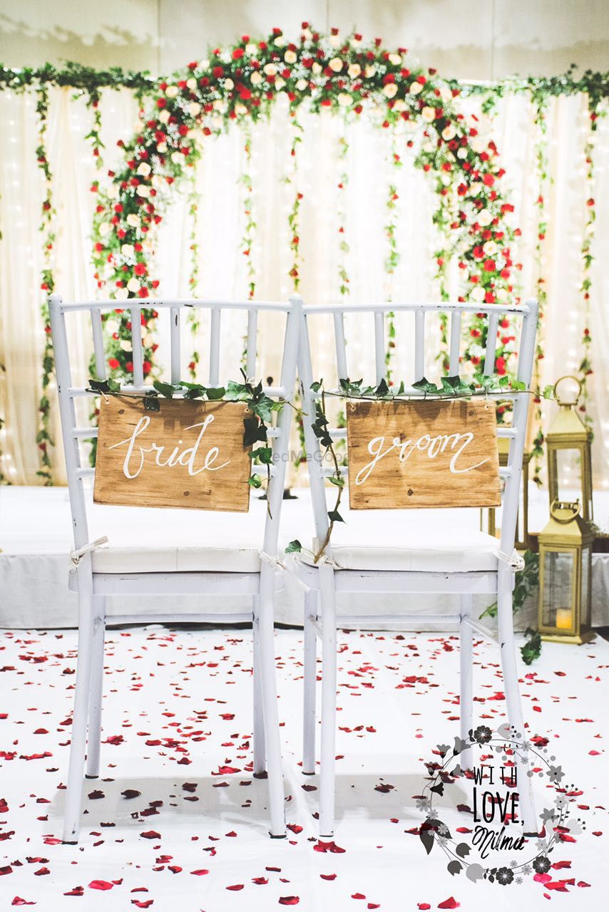 Photo of White Seating Dedicated to Couples